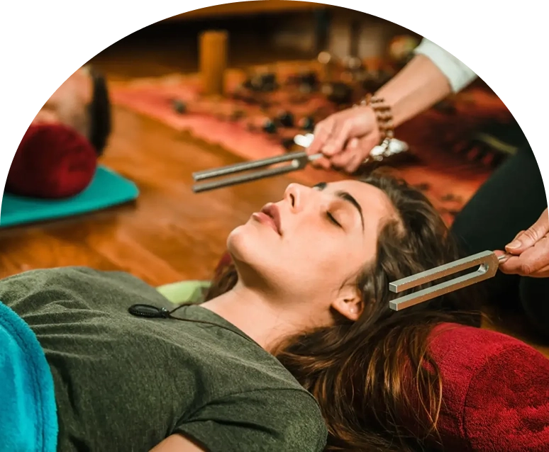 Woman experiencing sound healing therapy